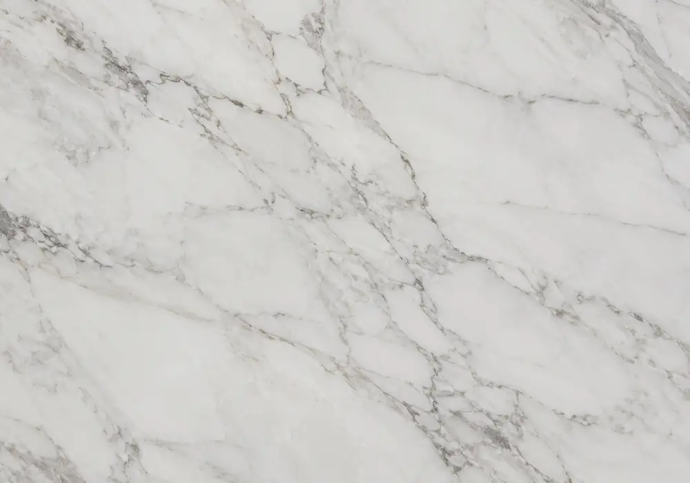 Check daino beige marble price on a warm cream slab with sweeping brown rivers, cloudy patches and subtle fossil traces.