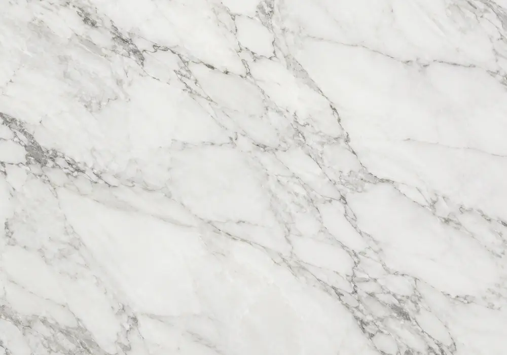 Armani Brown marble in an executive lounge, with natural veining, polished stone depth and refined architectural character.