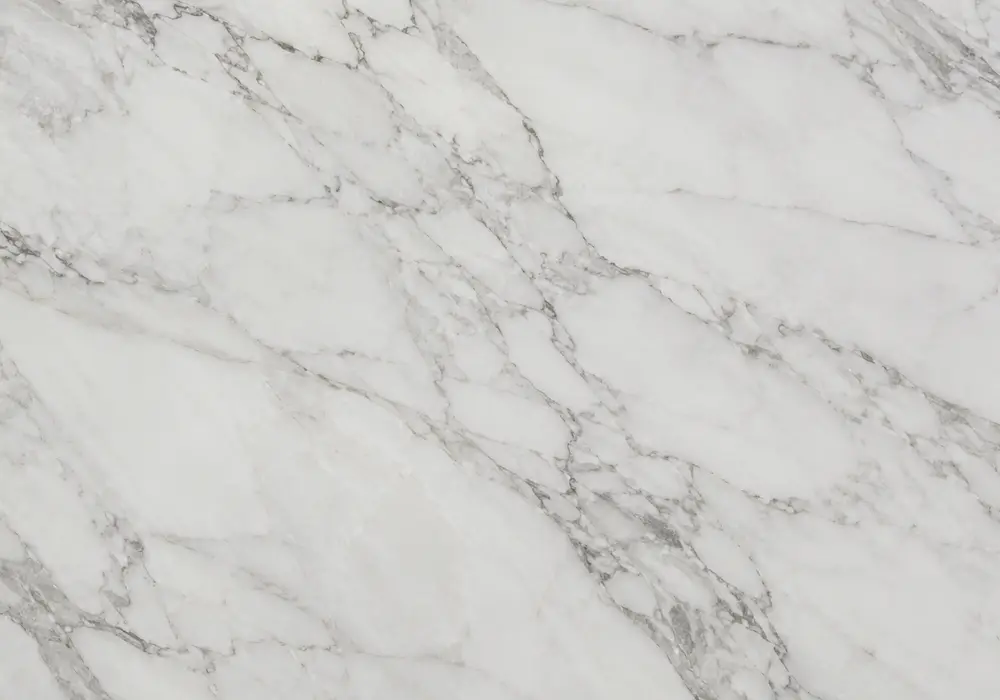 dark brown marble slabs across flooring, stairs and counters with coffee tones, cream veins and polished-honed contrast.