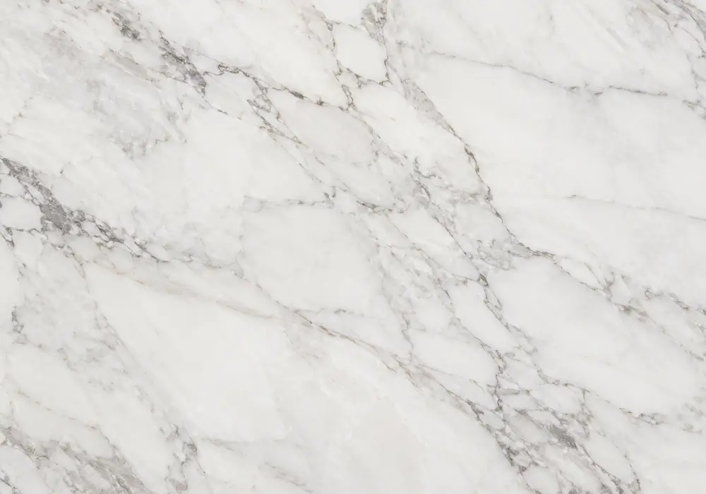Diamante Marble dining tabletop in a refined material gallery with natural slabs and coordinated wall finishes