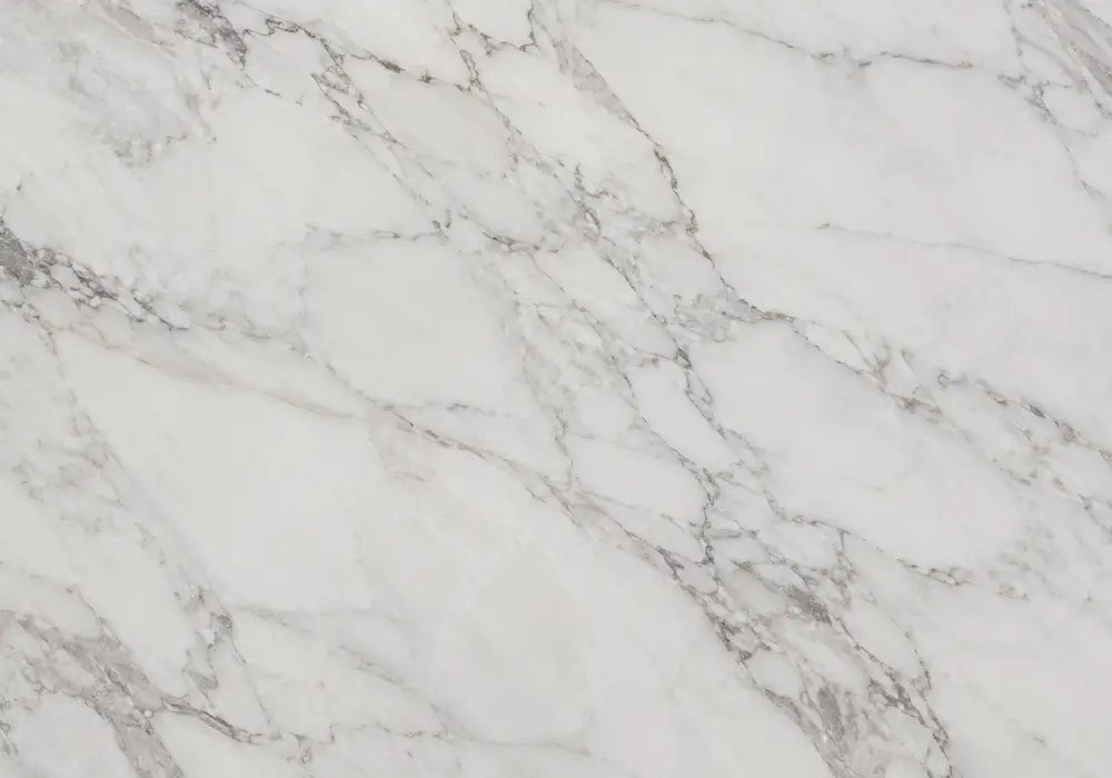 Silver-white crystals and soft grey ribbons illuminate Diamante Marble, aligned with the Diamante Marble Trading identity.