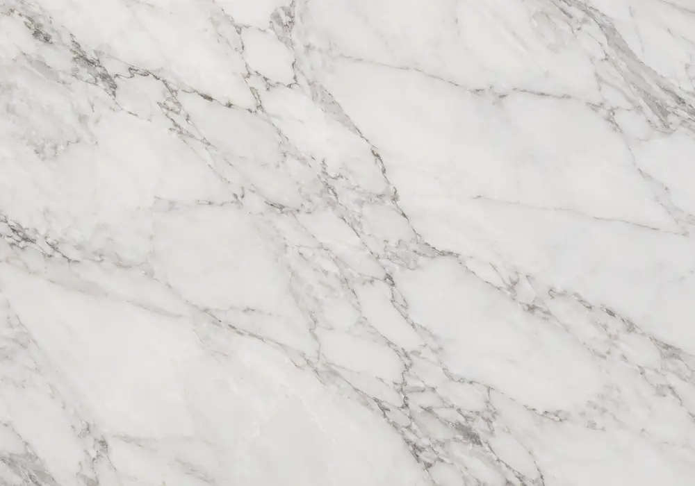 Super White dolomite in a high-end kitchen, showing natural veining, polished stone depth and refined architectural detail.