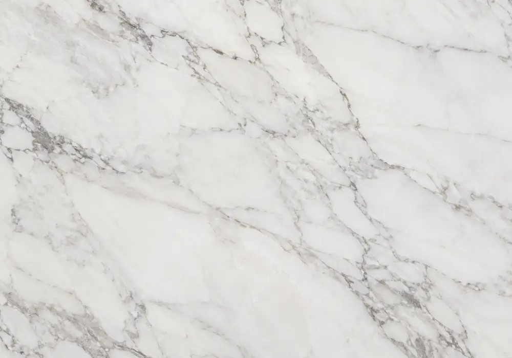 Bright dolomite marble countertops slab with crisp white crystal depth, silver-grey clouds, taupe veins and natural fissures.