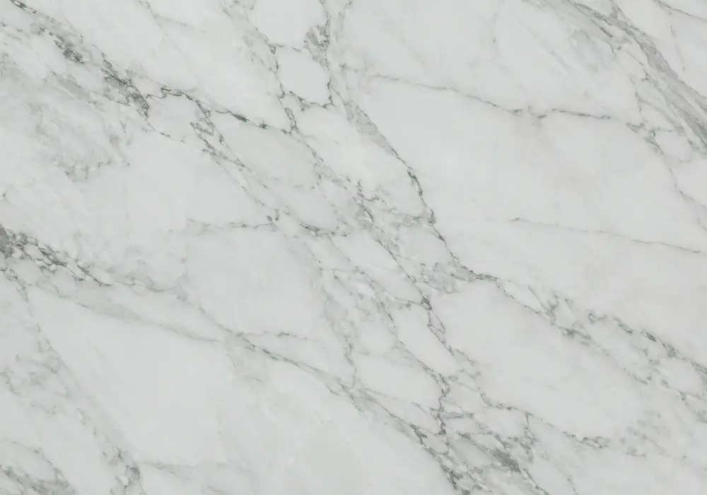 Emerald Glacier stone in a luxury powder room, with authentic veining, polished surfaces and refined architectural detail.