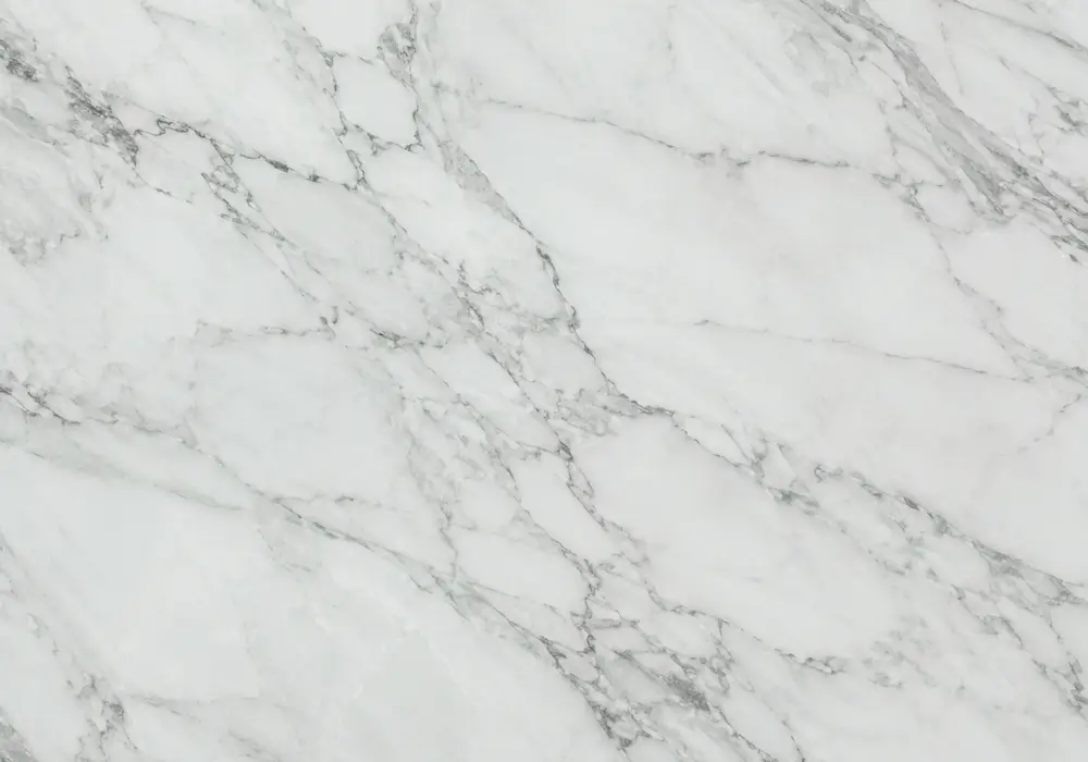 jade green slabs displayed in polished, honed and leathered finishes with varied emerald tones, pale veins and tile samples