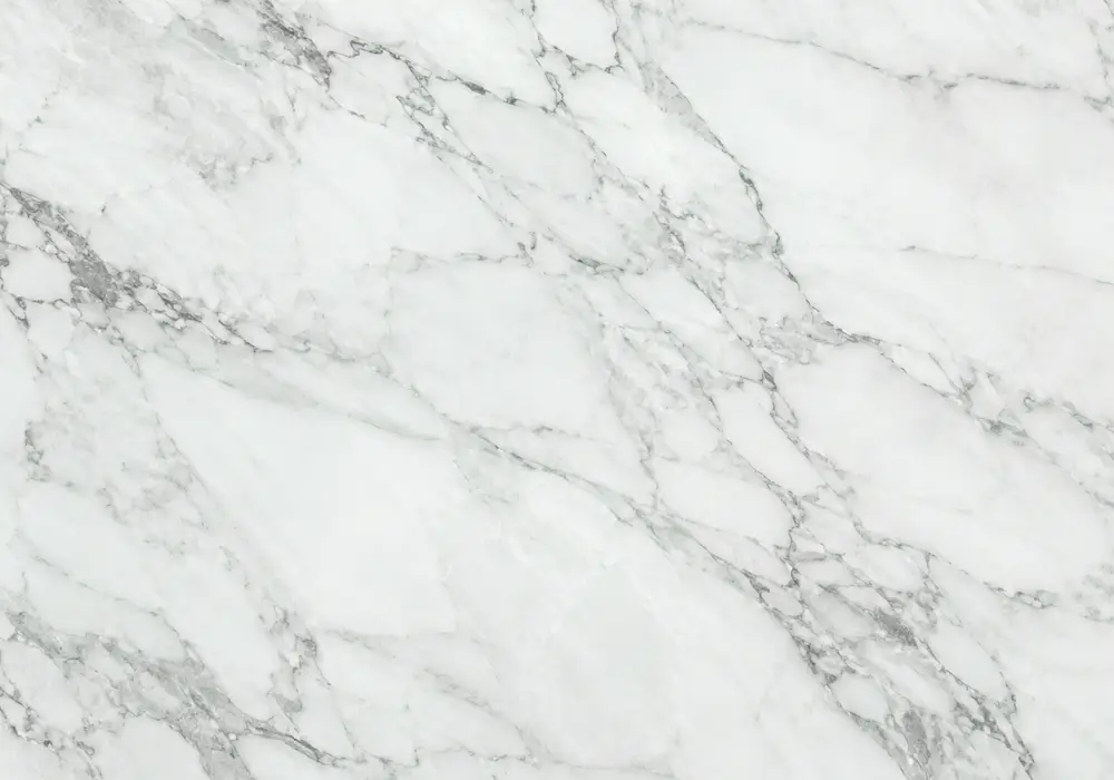 Emerald green marble statement fireplace with rich jewel-green stone and white, cream and dark mineral veining.