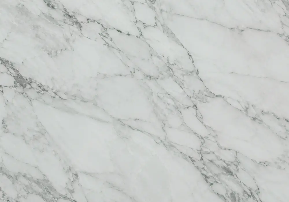 Jewel-green stone with pale branching veins and jade depth showcases the dramatic emerald green stone category surfaces.