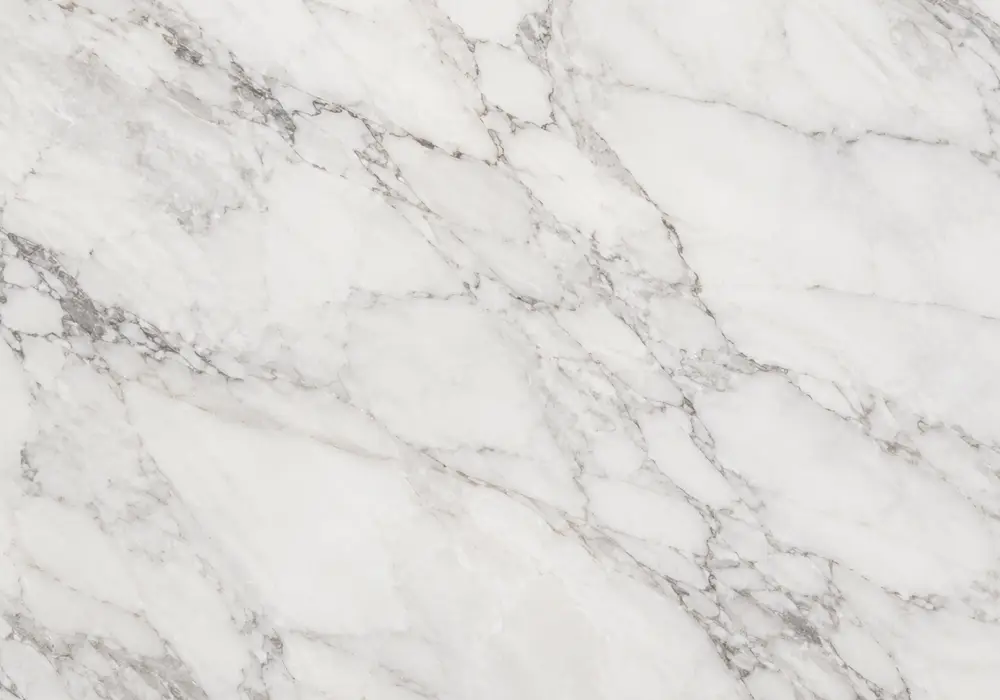 Emerald marble bookmatched foyer wall with vivid green stone and striking pale mineral veining.