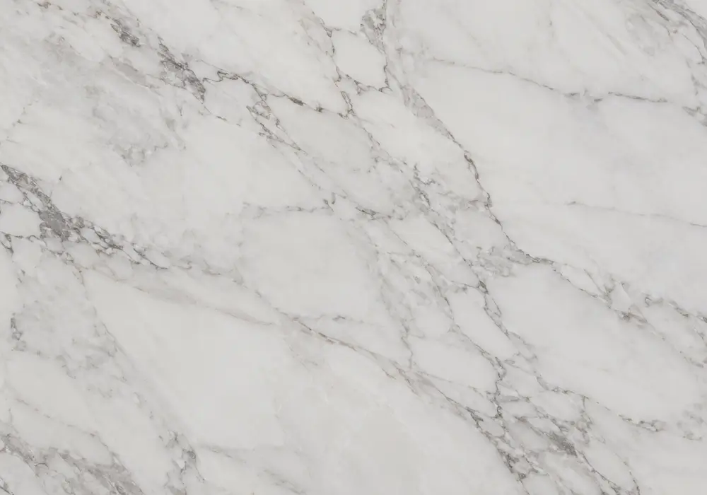 Emperador Marble polished and honed stone display in a premium showroom with large slabs and refined surfaces