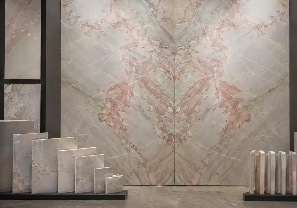 Fior Di Pesco marble luxury console top with misty grey and pale pink stone crossed by peach, violet and white veins.