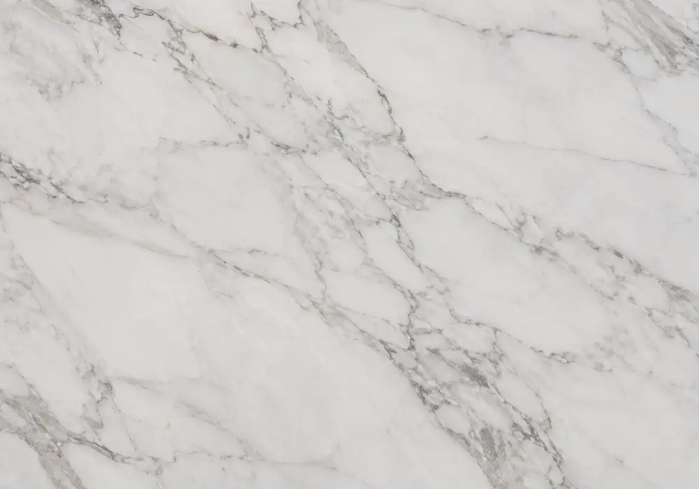Florence natural stone supplier showroom with full-height slabs, natural veining, polished depth and refined interior detail.