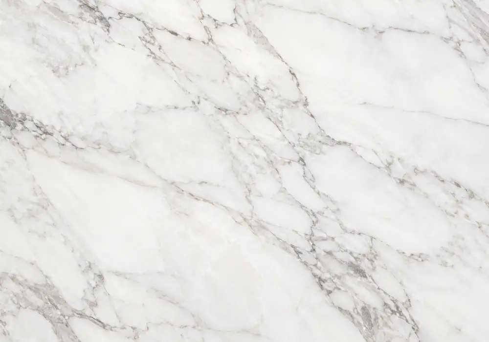 Flower Marble statement dining tabletop with warm ivory-blush stone and floral grey and rose patterns.
