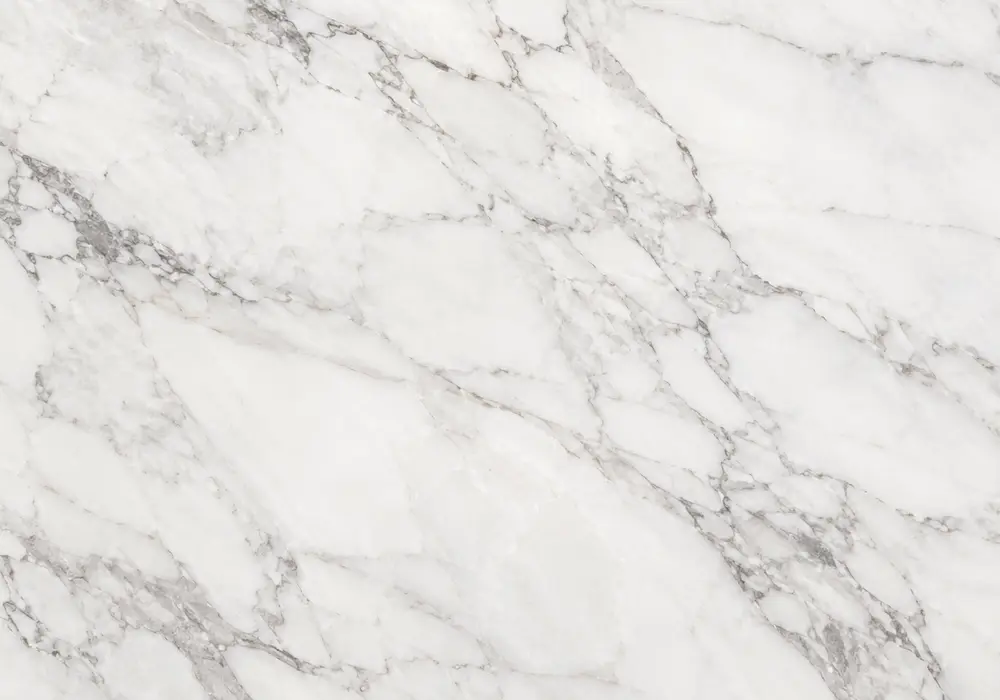 See flower beige marble in a blush-and-ivory slab with rose clusters, beige veins and soft petal-like mineral formations.