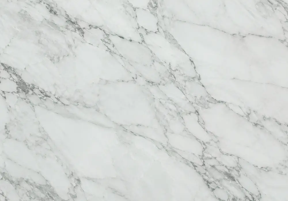 Forest Green Marble fireplace surround in a luxury stone showroom with upright slabs and refined wall finishes