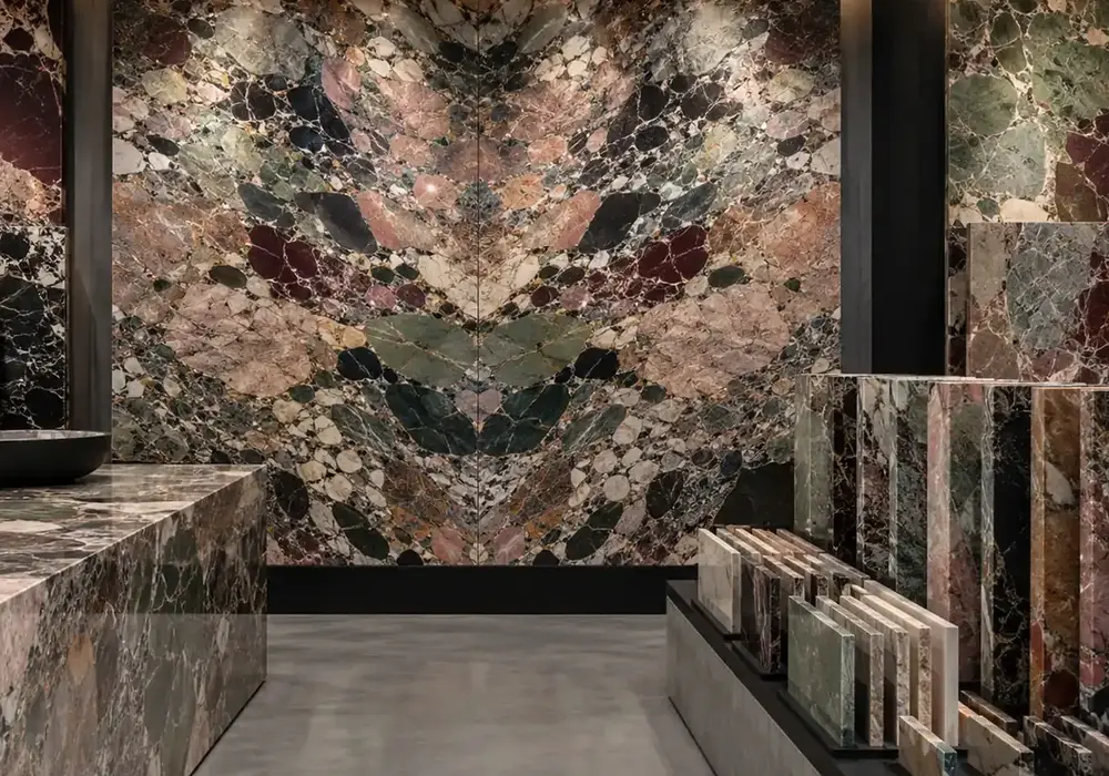 vivid botanical vein texture used across a statement wall, flooring and an island countertop, with authentic slab variation.