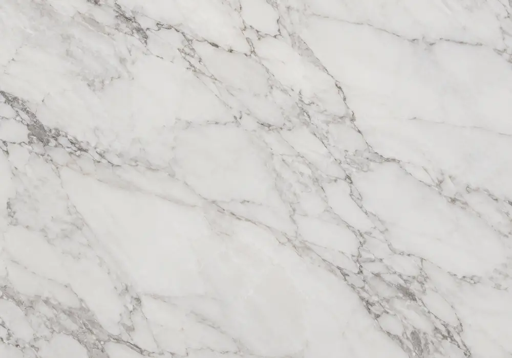 View French Vanilla marble price: beige and ivory stone with sweeping ribbons and flowing waves, and natural tonal variation.
