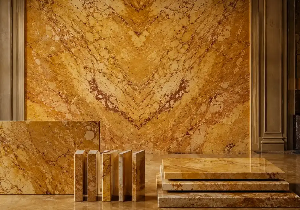 sophisticated sunlit decorative surface across wall cladding, flooring and an island countertop, with natural slab variation.