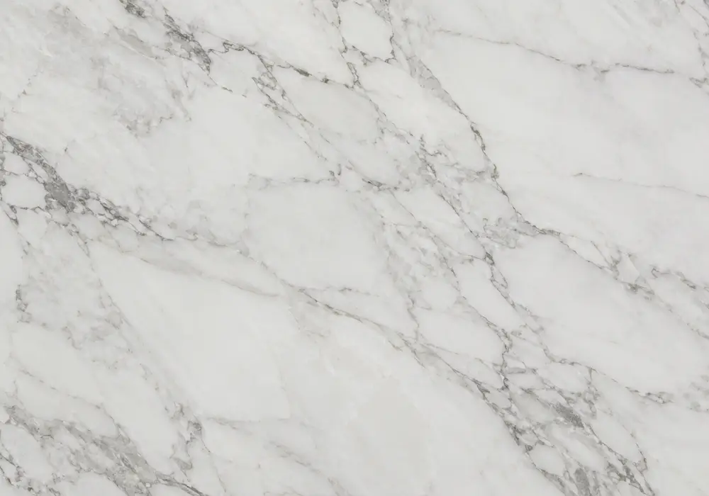 Gold Calacatta marble luxury bookmatched fireplace with luminous white stone and elegant grey veins edged in warm gold.