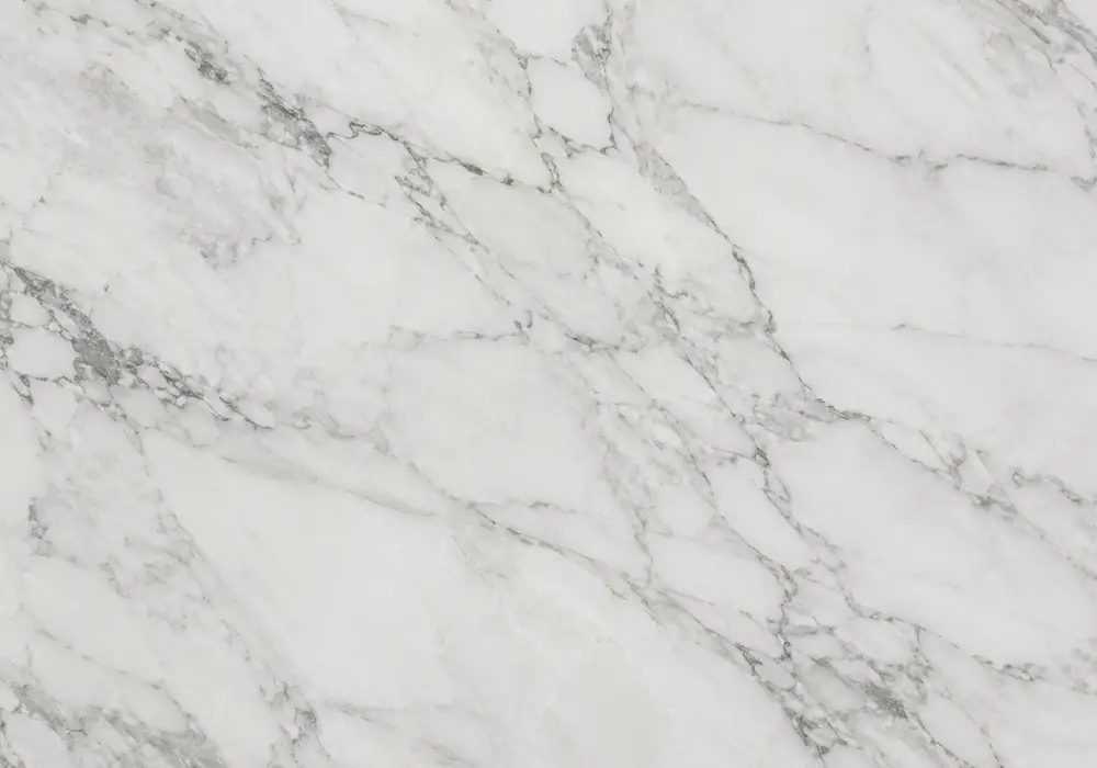 Calacatta Oro marble in a luxury kitchen, with authentic veining, polished stone depth and refined architectural detailing.