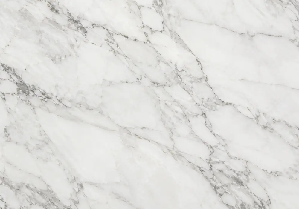 Bold Golden Portoro marble UAE slab with lustrous black depth, sweeping yellow-gold strokes and amber branching networks.
