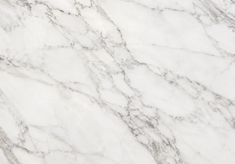 Greek Calacatta marble luxury foyer wall with bright white stone and elegant flowing grey mineral movement