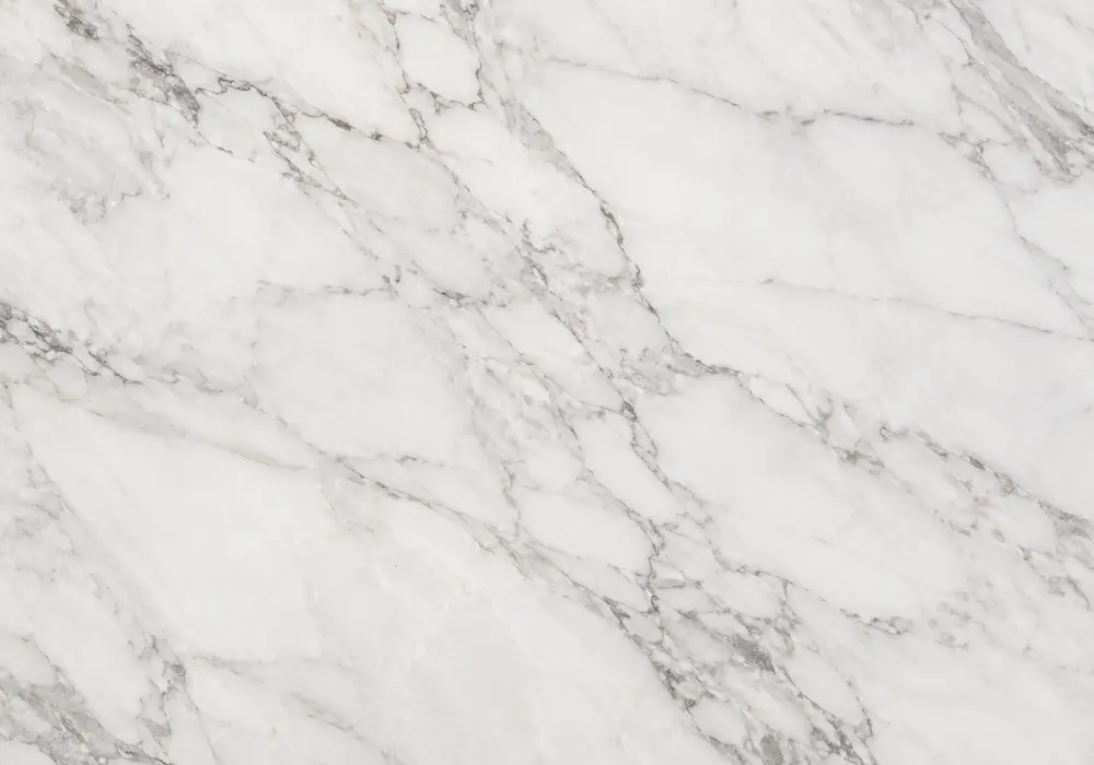 Greek Calacatta marble price image featuring white and gold, branching veins and natural veining, and controlled reflections.