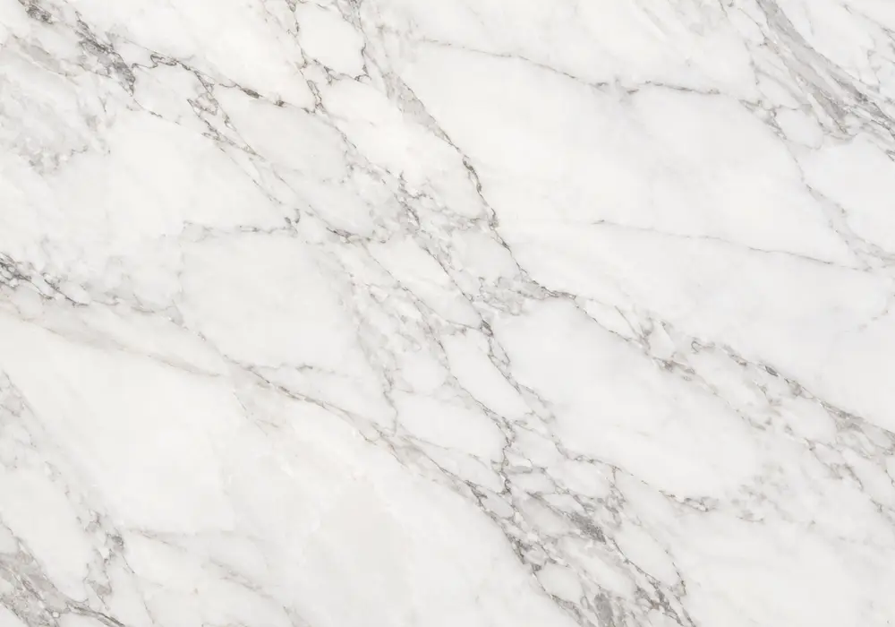 Greek Thassos marble bright fireplace surround with pure crystalline white stone and minimal natural markings