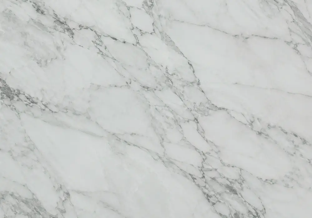 Verde Levanto stone slabs and tiles displayed with polished, honed, leathered and tumbled finishes in a premium showroom.