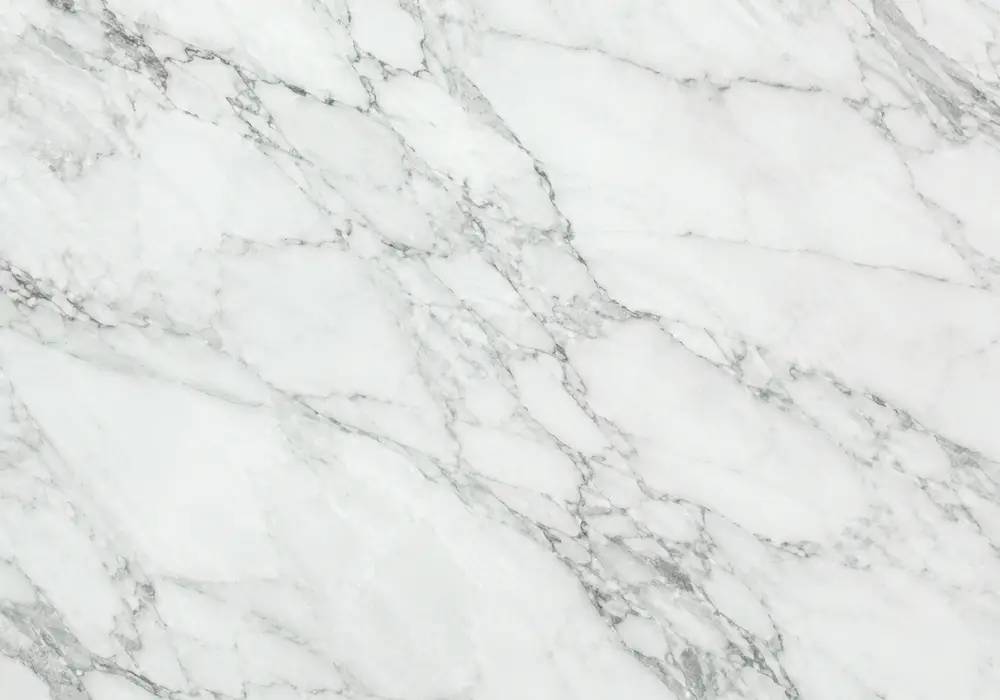 Luminous Green Sky Marble Abu Dhabi stone slab with pale jade, seafoam and teal tones shaped by flowing white-grey movement.
