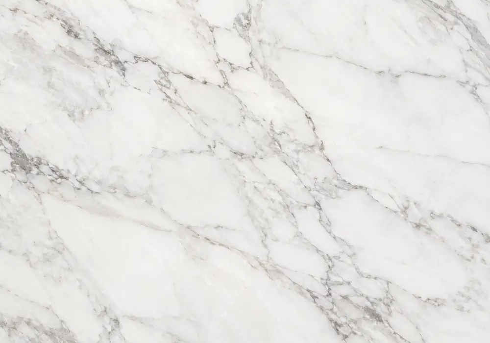 Grey Wood marble price shown on a polished grey and brown slab with flowing waves and soft swirls, across a luminous surface.