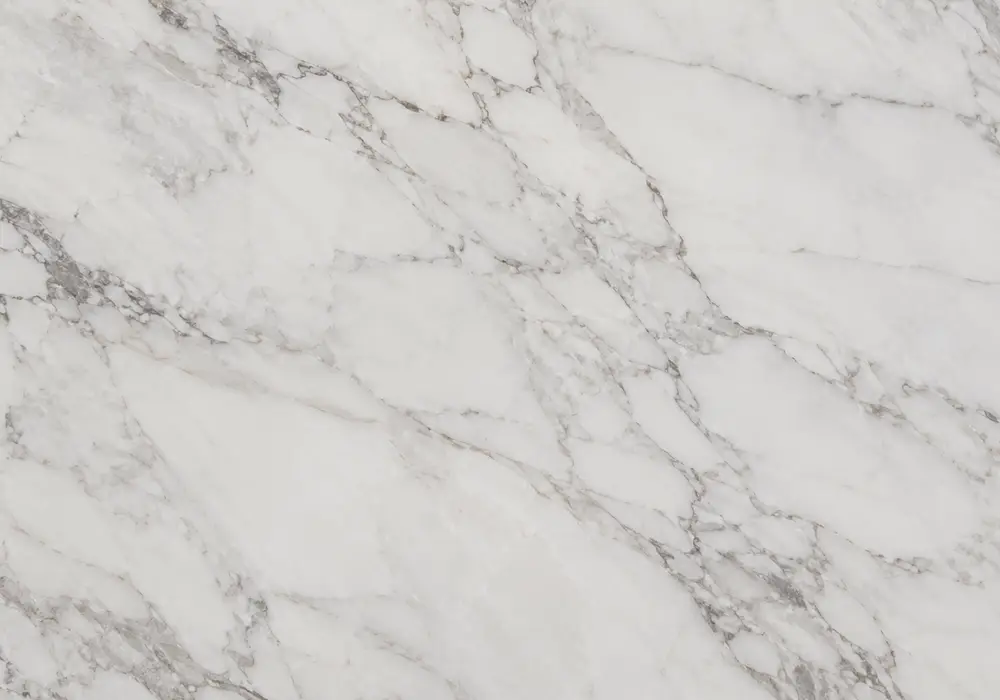Fine grey and beige threads soften luminous Ibiza White Marble, highlighting the calm look of Turkish Ibiza White stone.