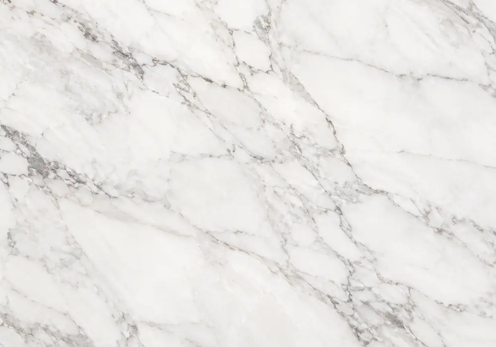 Ice Berg bathroom with polished vanity and shower wall, honed floor and ledge in crisp white stone with icy blue-grey veins.