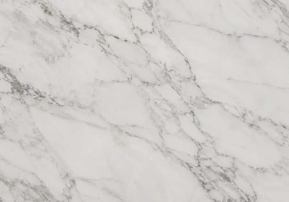 Ice Berg White marble in a luxury bathroom, with natural veining, polished stone depth and refined architectural character.