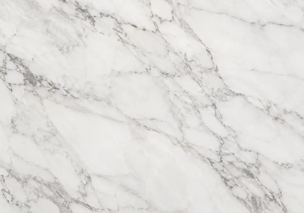 Ice Jade marble slab in a luxury bathroom, showing natural veining, polished stone depth and refined architectural detail.