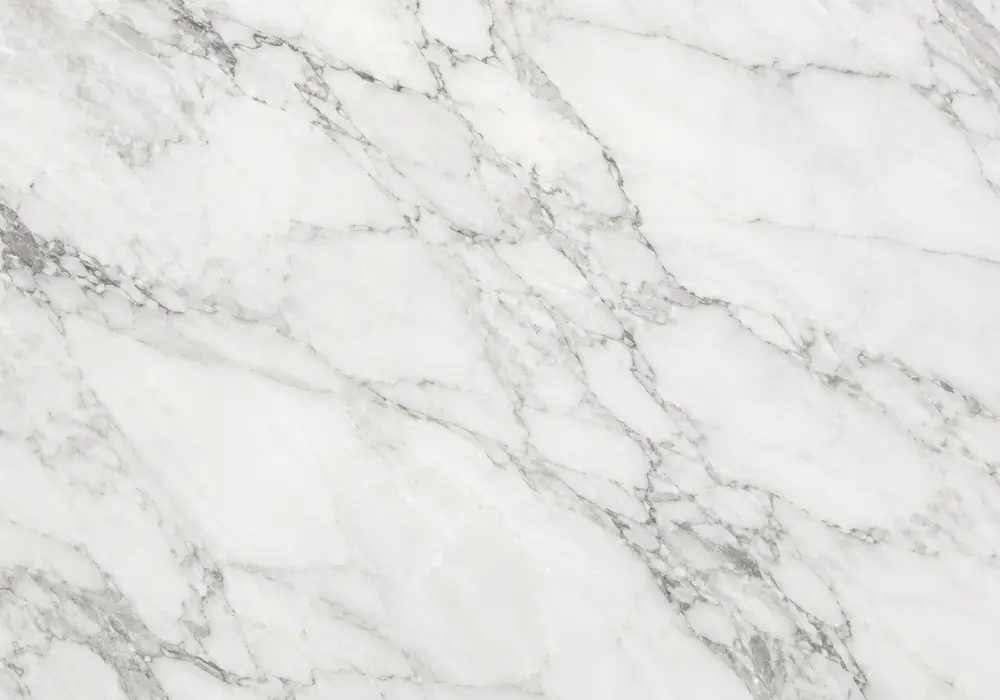 Indus Gold slab in a luxury hotel foyer, showing natural veining, polished stone depth and refined architectural detail.