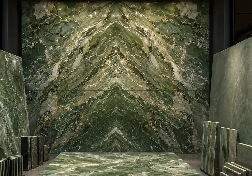Irish Green marble luxury console tabletop with layered emerald, moss and jade tones and fluid pale mineral streaks.