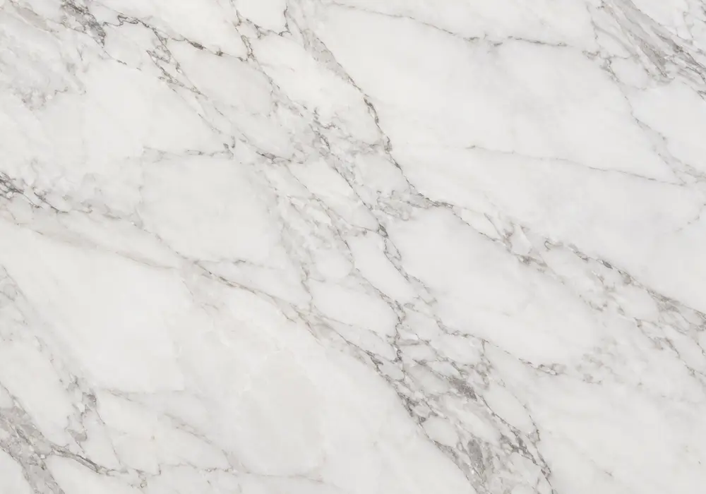 Italian Carrara Marble slabs aligned for continuous grey vein matching in a professional fabrication layout