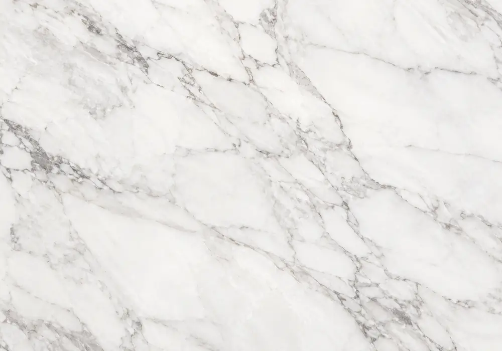 Real Italian carrara slabs with polished island, vanity, honed floor tiles and feathery grey veining for grade comparison