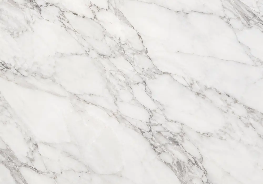 carrara CD marble in a timeless bathroom, showing natural veining, polished stone depth and refined architectural detail.