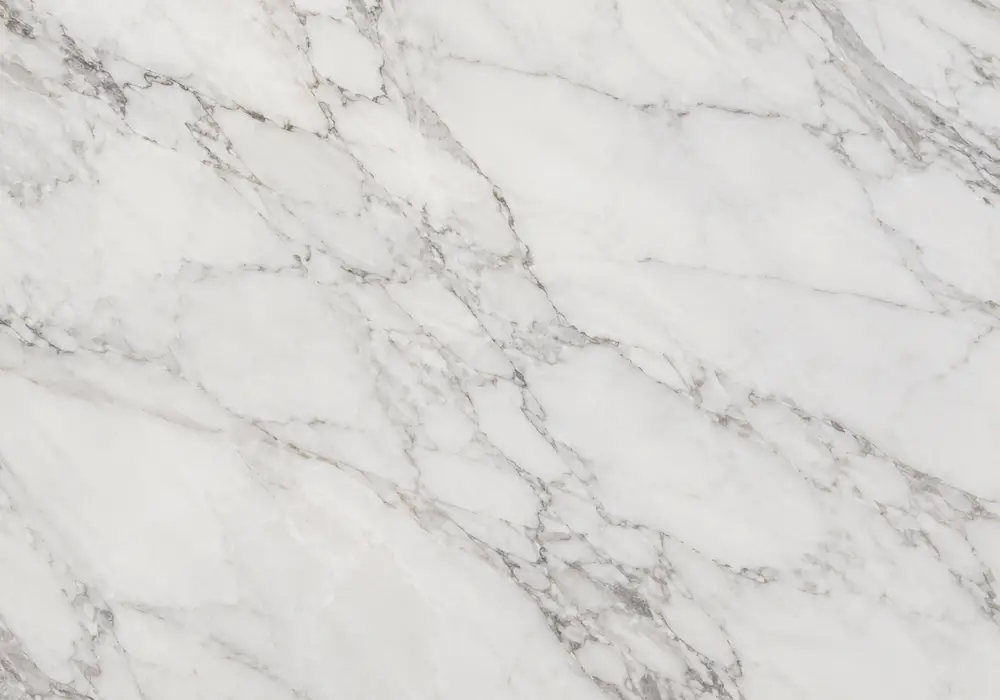 Italian Marble dining tabletop in a luxury stone gallery with upright slabs and refined architectural finishes