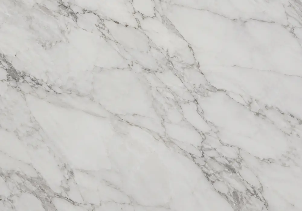 ivory flooring and stairs with polished wall panels, kitchen counter and vanity in warm cream stone with fossils and clouds.