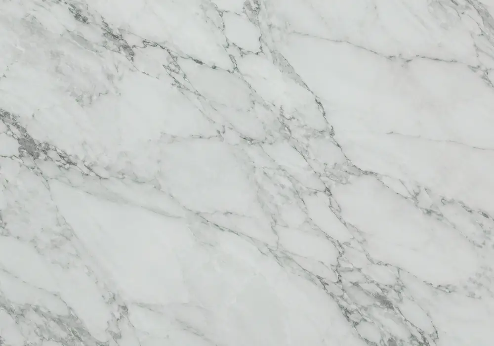 Vivid Jade Green marble price slab with emerald depth, pale flowing veins, cloudy mint transitions and subtle crystal marks.