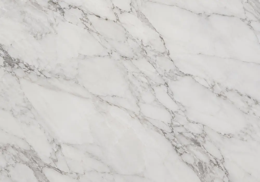 Ice Jade marble in a luxury bathroom, showing natural mineral movement, polished depth and refined architectural character.