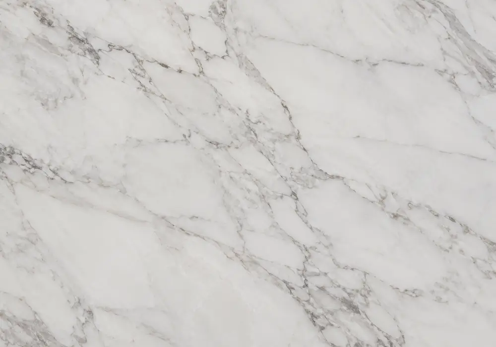 Lasa White flooring with honed stairs, polished wall cladding, kitchen island and vanity in crystalline white and muted gold.