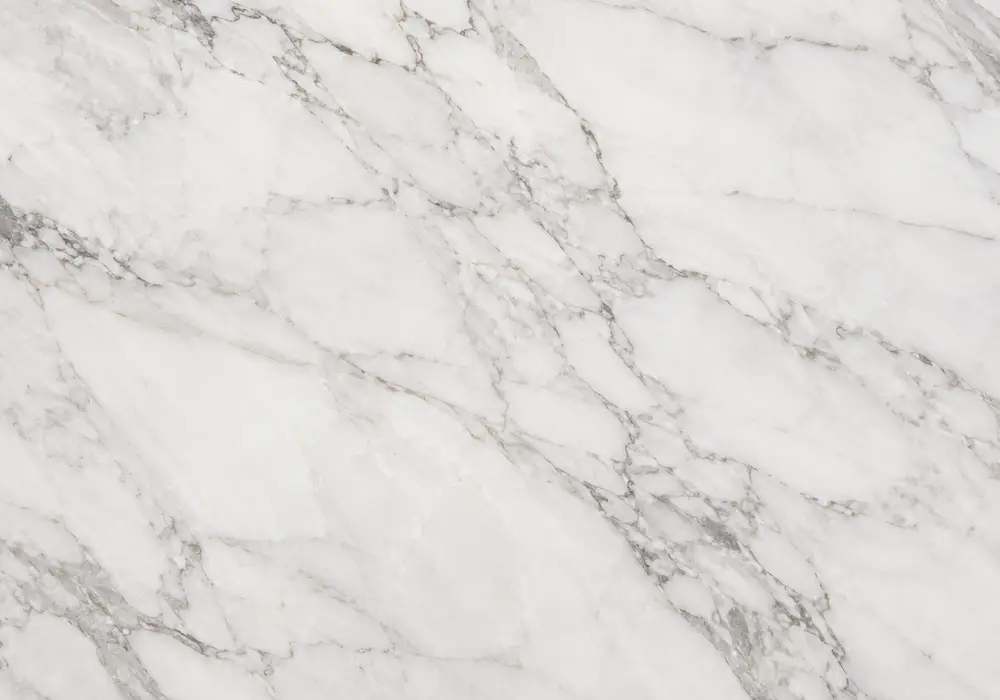 Laaser Marmor featured in a gallery-like luxury interior, with natural veining, polished depth and refined interior detail.