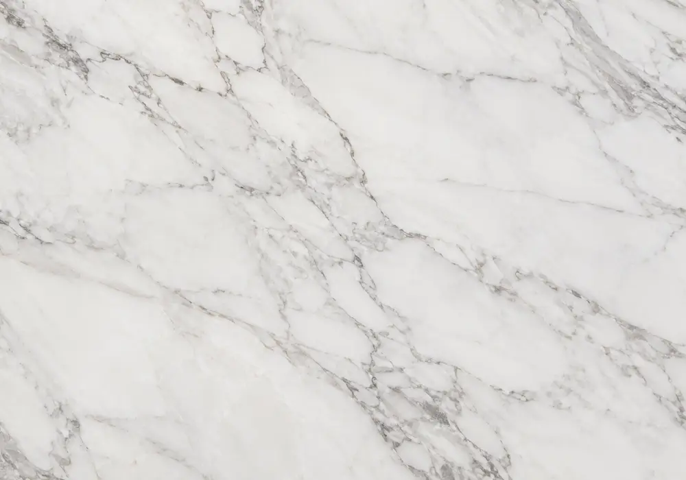 Lavina Gray slabs in an office lobby, showing natural mineral movement, polished depth and refined architectural character.