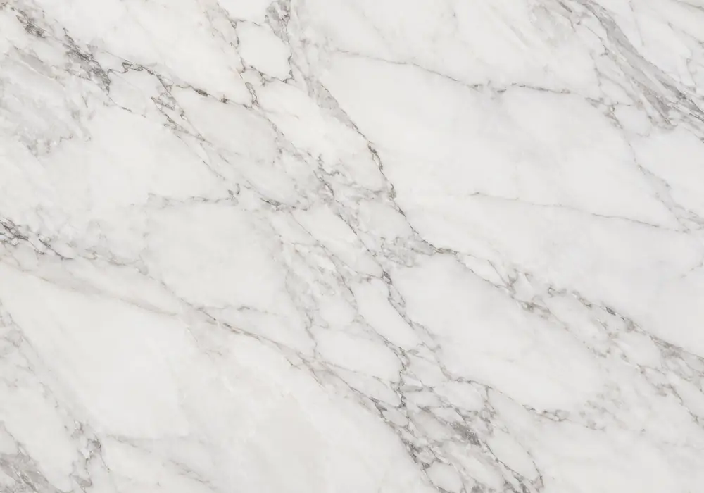 Levanto marble fireplace surround with rich green natural stone and contrasting elegant mineral veining.