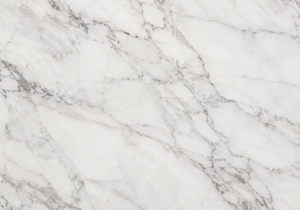 white and gold veining in a contemporary bathroom, with natural slab variation, natural stone depth and architectural detail.