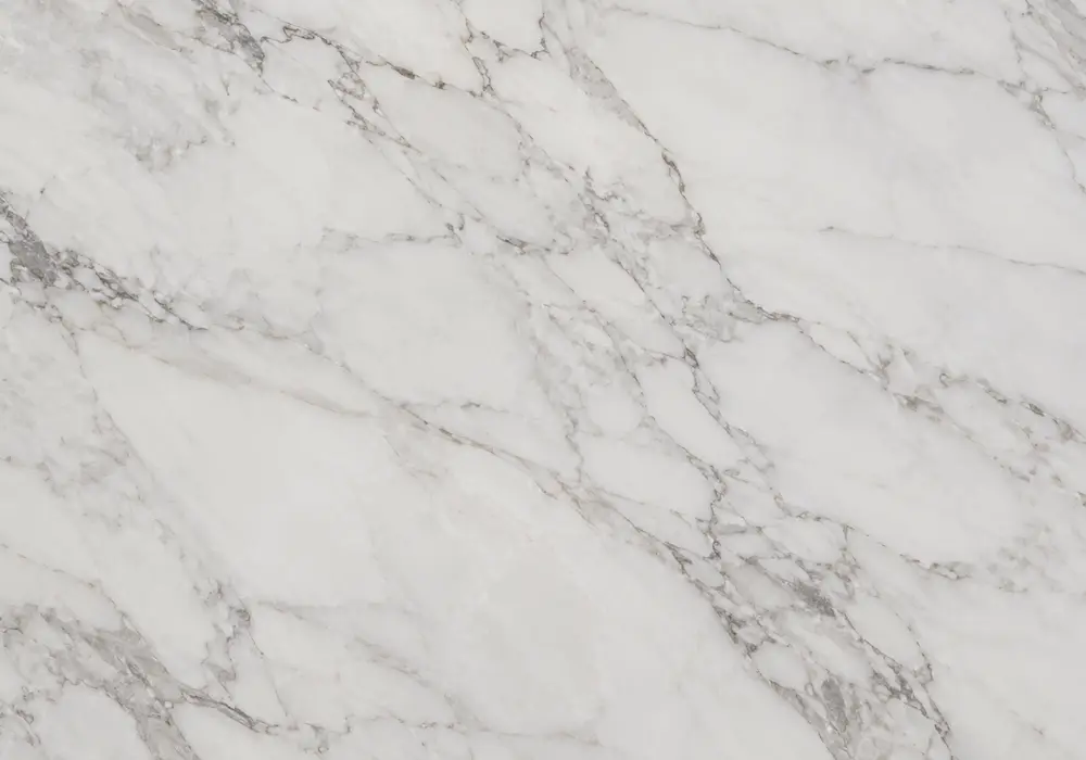 polished Light Emperador on a kitchen island and backsplash with a honed vanity, cream webbing and warm cappuccino movement.