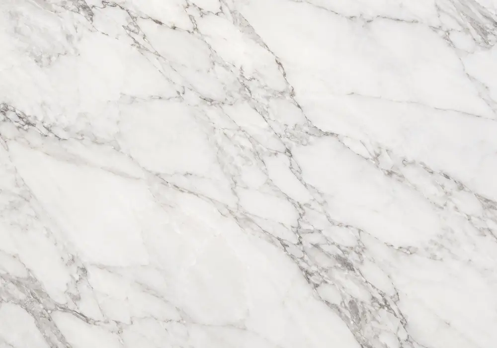 Pale silver veining drifts across polished Light Grey Marble, presenting a refined surface in the light grey stone category.